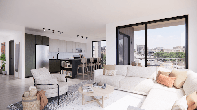 a living room with a white couch and chairs and a kitchen with a large window